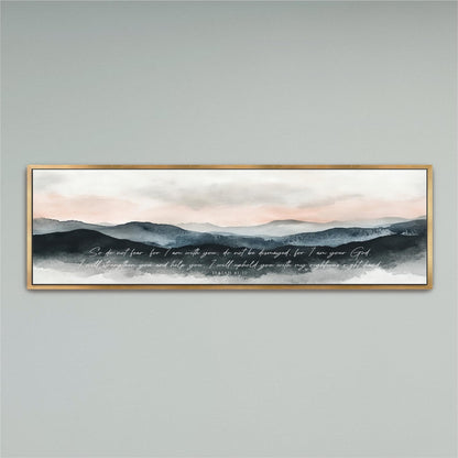The image is a framed watercolor painting depicting a serene landscape with mountains and a cloudy sky.