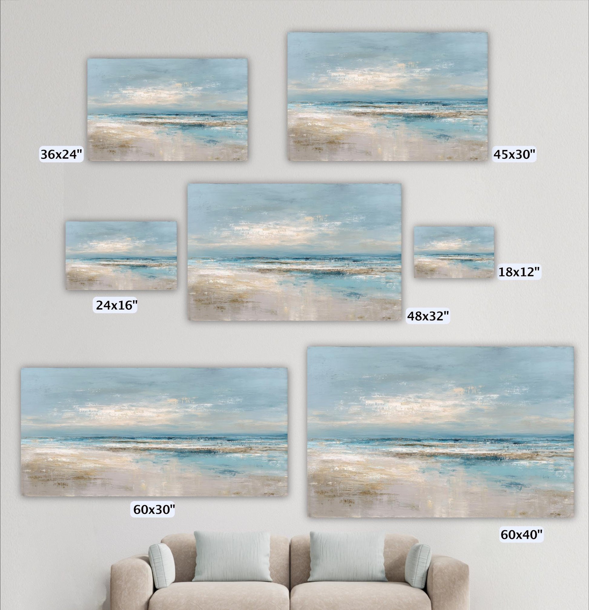 a collection of seven landscape paintings of varying sizes, each depicting a serene beach scene with a blue sky and ocean. The paintings are arranged in a grid format, with each one being a different size, ranging from 36x24 inches to 48x32 inches. The paintings are displayed on a wall, and there is a couch in the foreground.