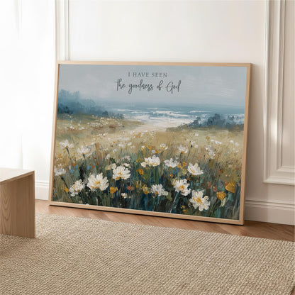 The image is a framed painting depicting a field of white flowers against a blue sky.