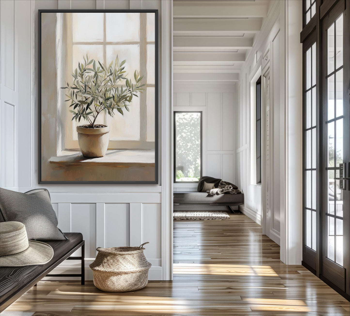 a bright and airy living room with a large window, a potted plant, and a comfortable couch.