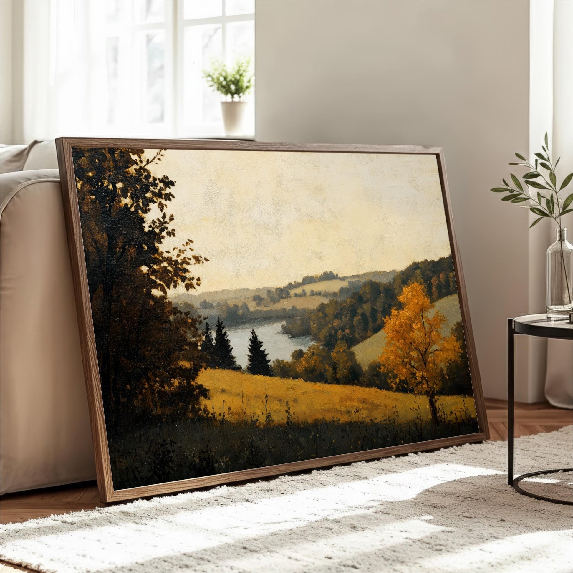 a large landscape painting depicting a serene countryside scene with rolling hills, trees, and a river.