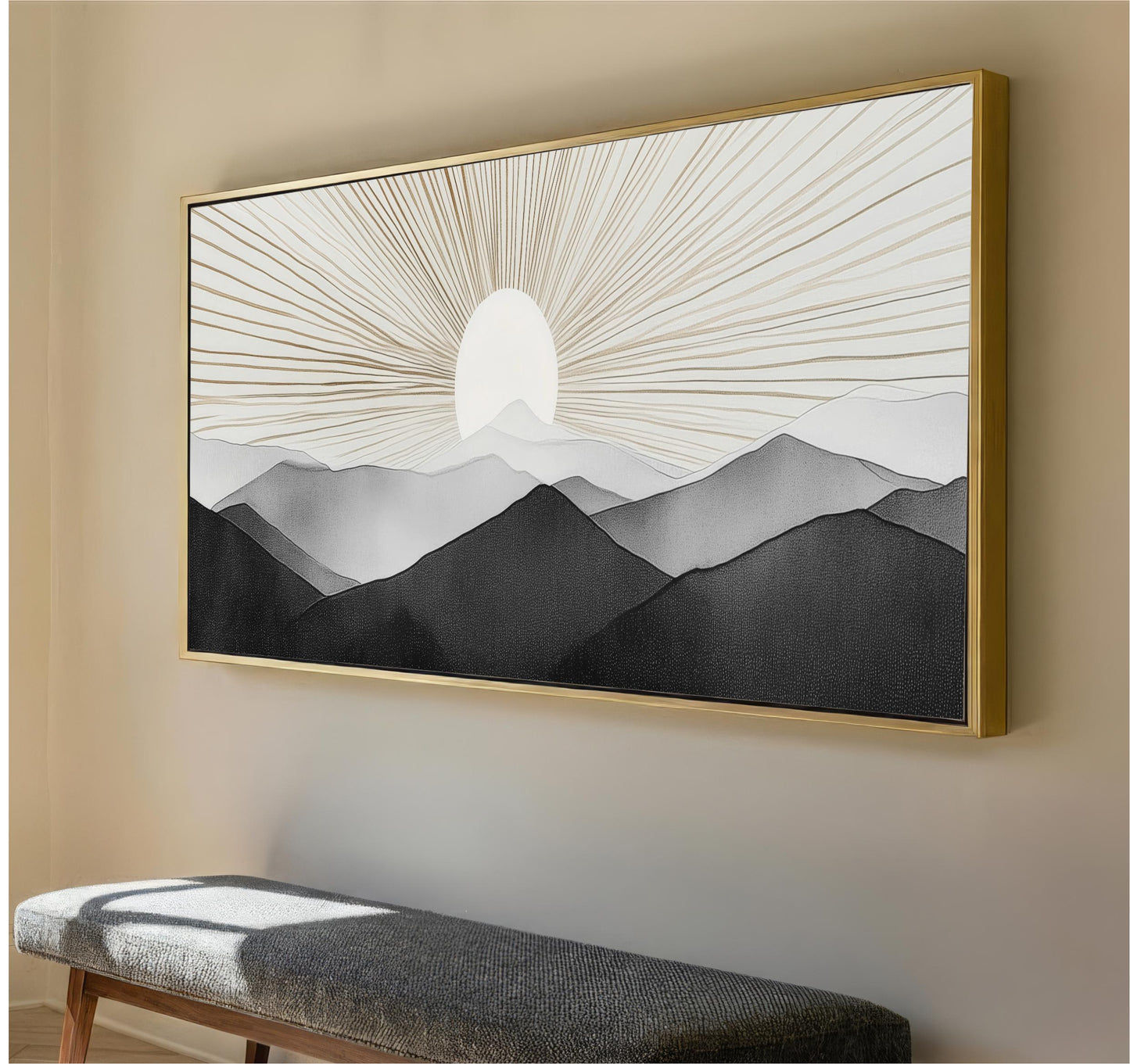 a large framed painting of a mountain landscape with a sun in the background.