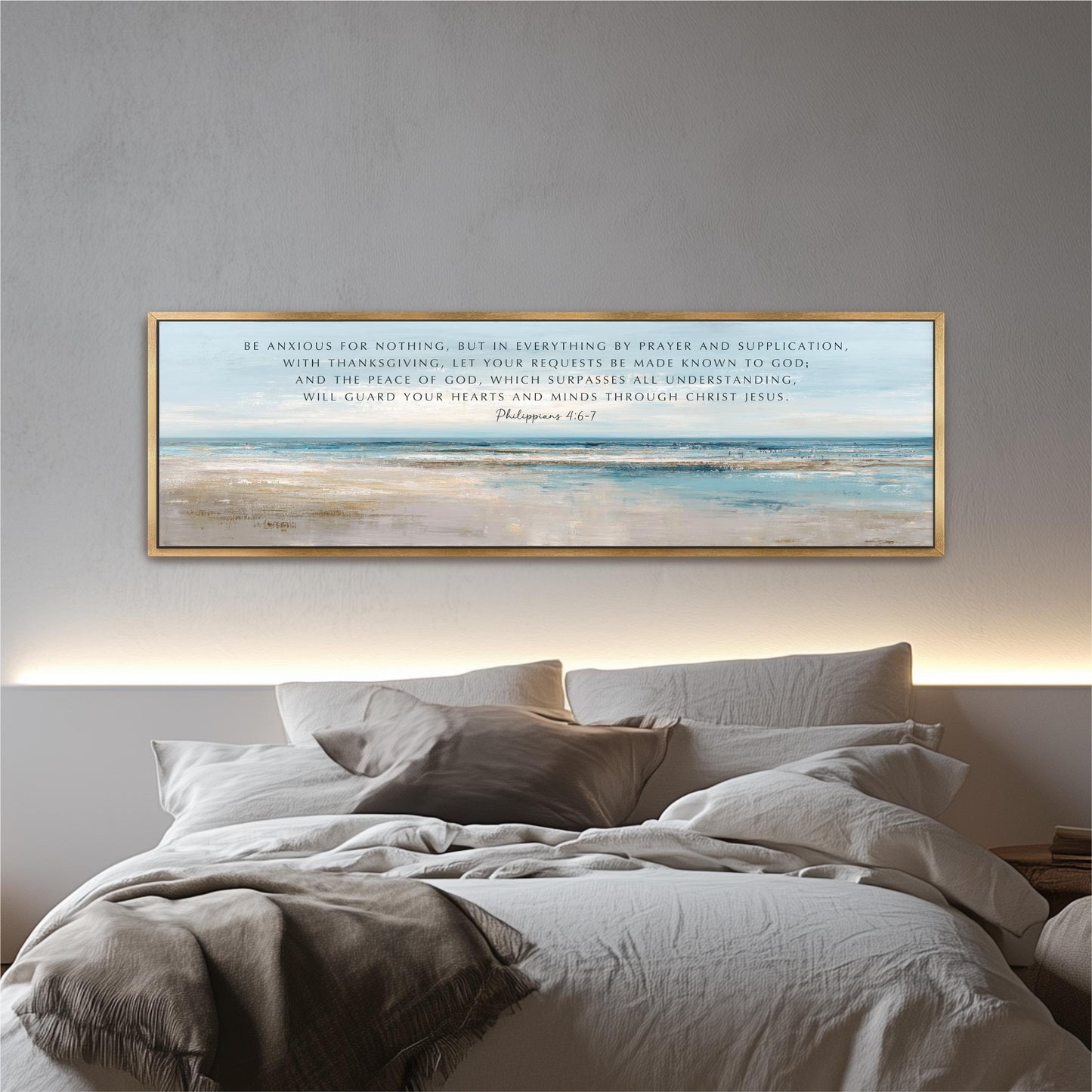a bedroom setting with a bed and a framed Bible verse on the wall above it.