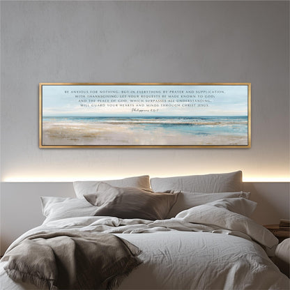 a bedroom setting with a bed and a framed Bible verse on the wall above it.