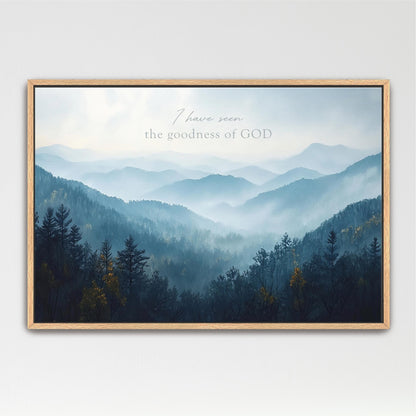 a serene mountain landscape with a forested area in the foreground.