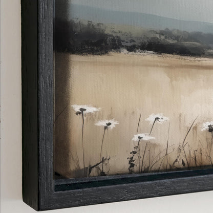The image is a framed painting depicting a serene landscape with a field of white flowers in the foreground and a hazy background.