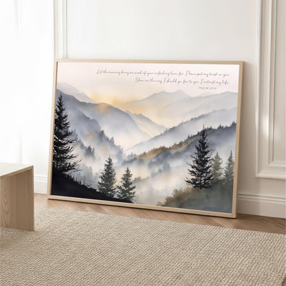 The image is a framed painting depicting a serene mountain landscape with pine trees and a hazy, misty atmosphere.