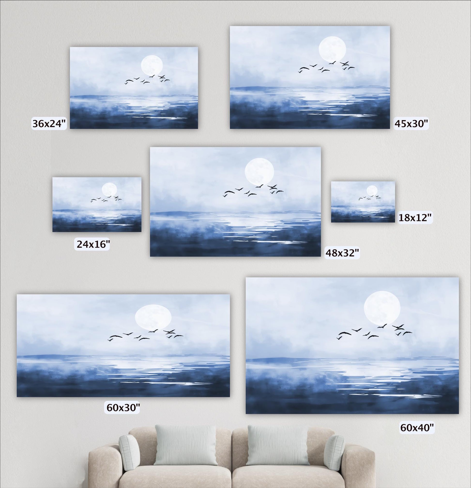a collection of seven different-sized paintings or prints of a serene landscape, depicting a calm body of water with a full moon and birds flying over it. The paintings vary in size, ranging from 36x24 inches to 48x32 inches, and are arranged in a grid-like pattern on the wall.