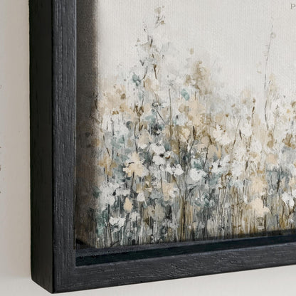 The image is a framed painting depicting a field of flowers with a mix of white, green, and gray colors.