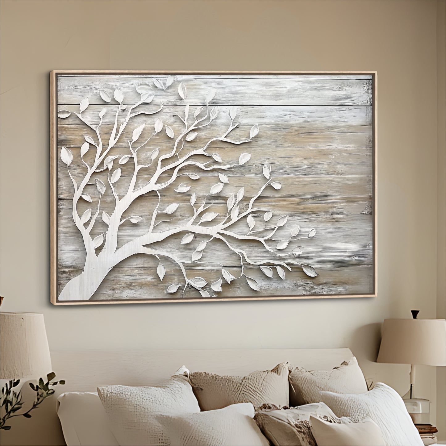 a large wooden wall art piece depicting a tree with white leaves, hanging above a bed with white pillows.