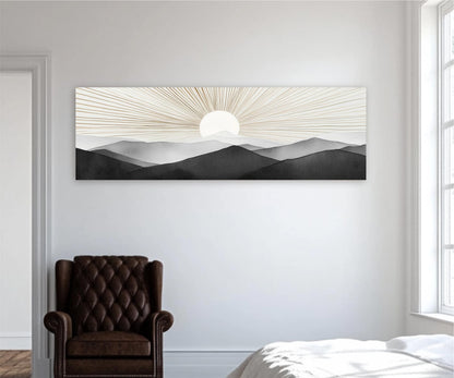 a large, rectangular wall art depicting a serene landscape with mountains and a sun in the background.
