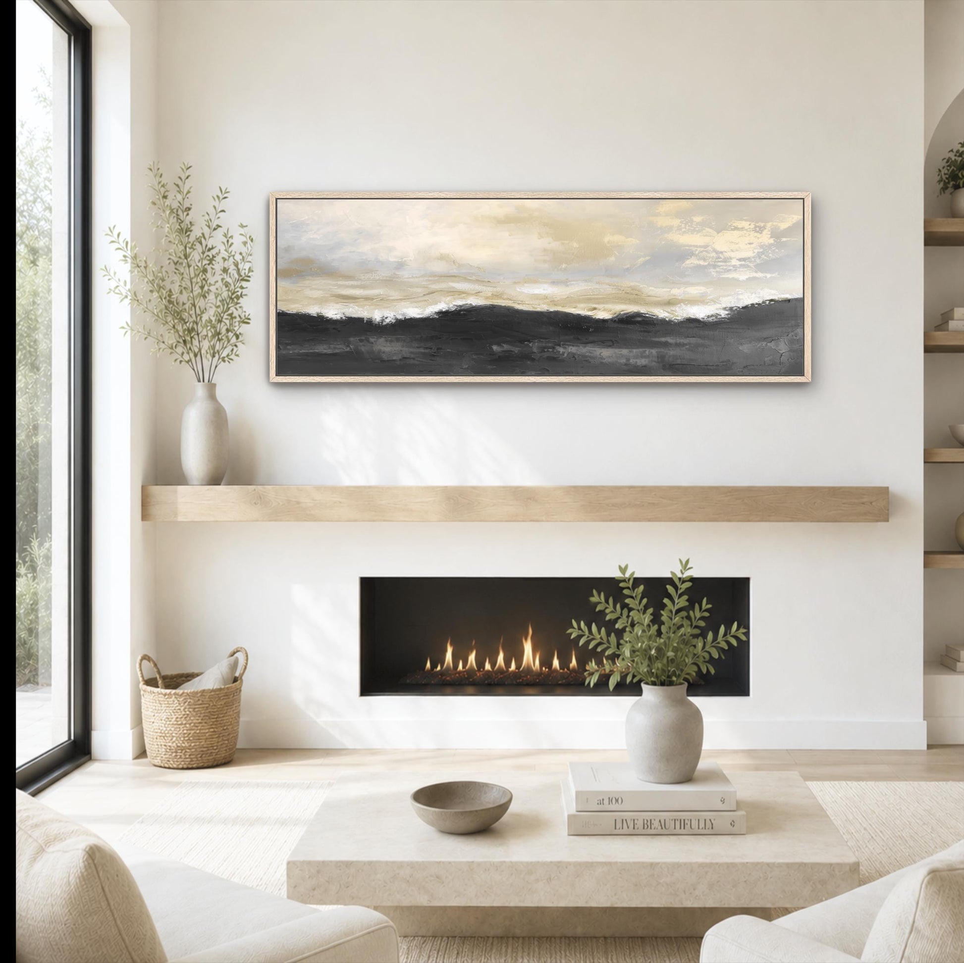 a cozy living room with a fireplace, a coffee table, and a painting on the wall. The room has a minimalist and modern design, with a neutral color palette and natural elements like plants and a woven basket.