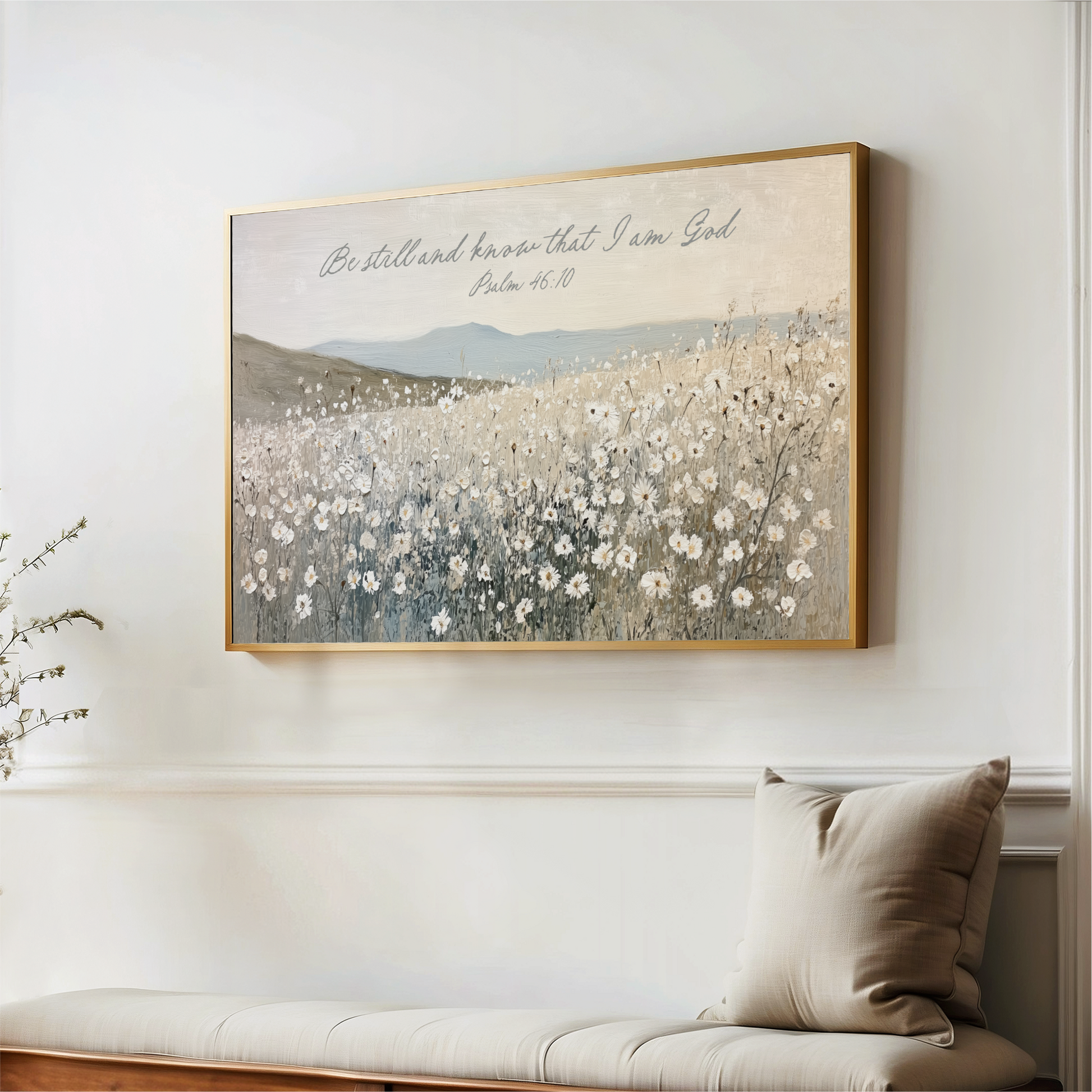 a large framed painting of a field of flowers hanging on a wall.