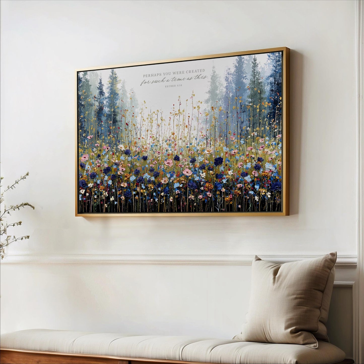 a large framed painting of a field of flowers hanging on a wall.