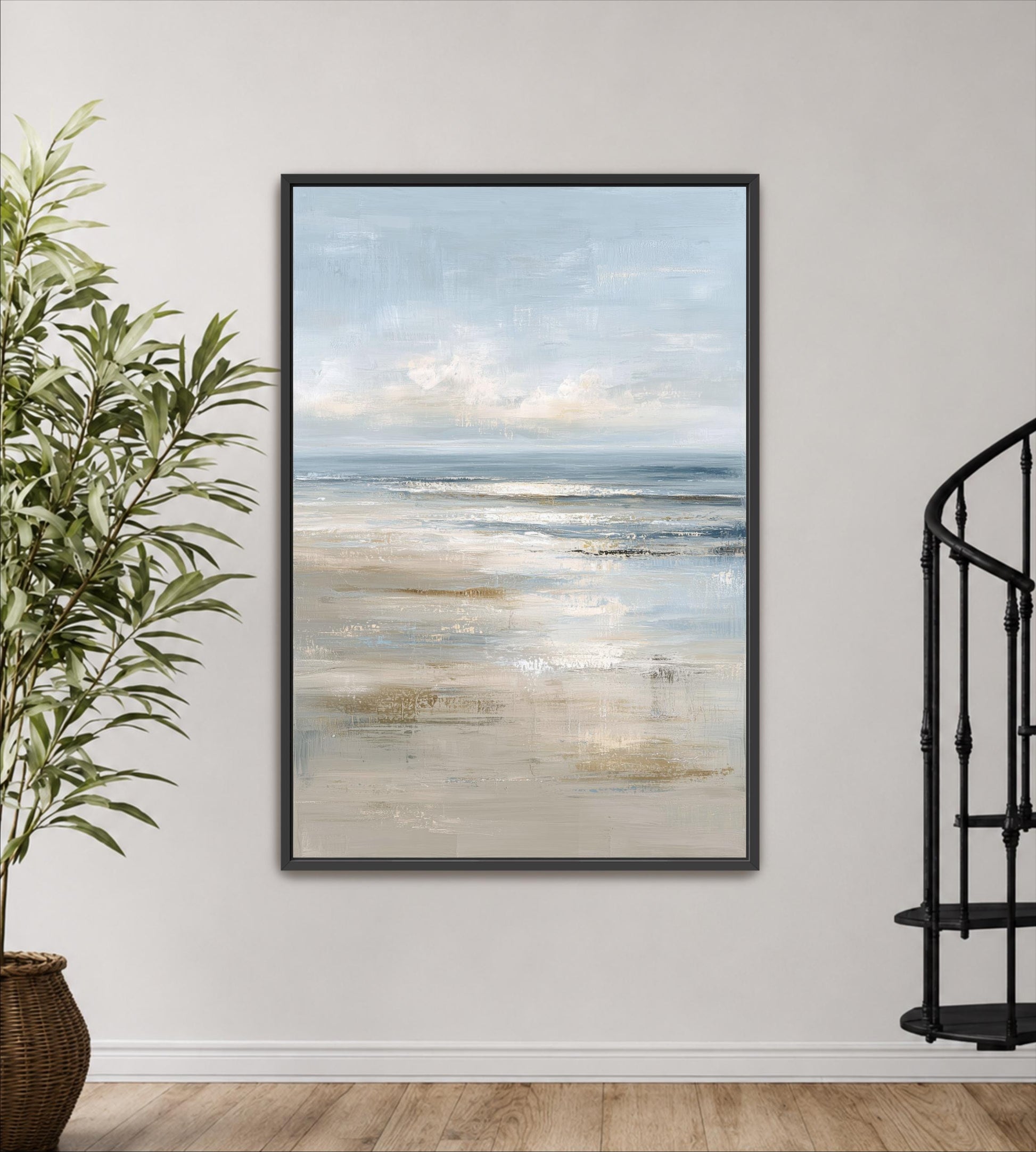 a large framed painting of a serene beach scene hanging on a wall.