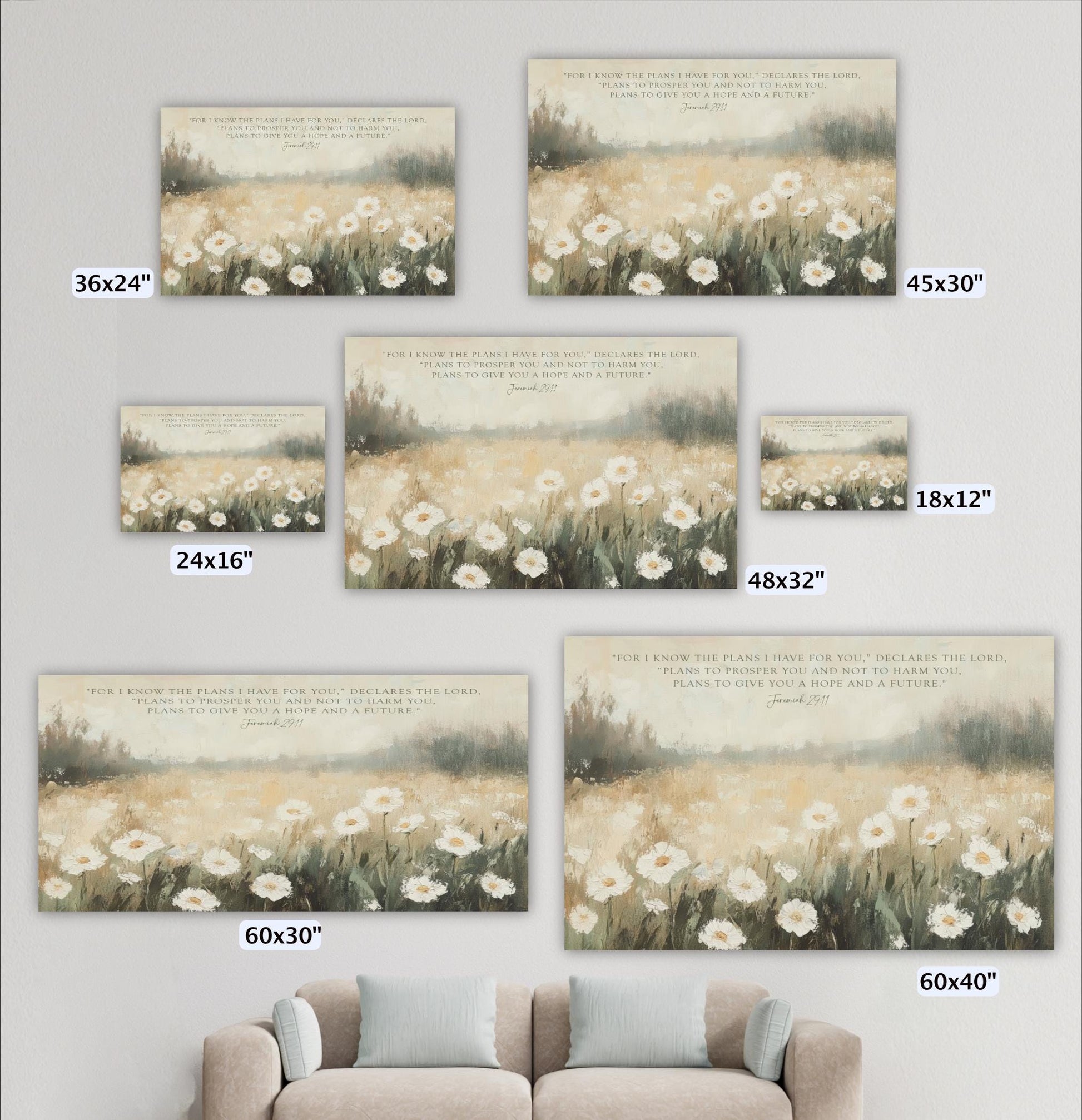 a collection of five framed paintings or prints of a field of white flowers, each with a different size and frame. The paintings are arranged on a wall, and there is a couch in the background.