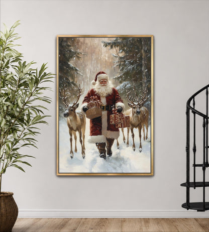 A framed painting depicting Santa Claus walking through a snowy forest with two reindeer.