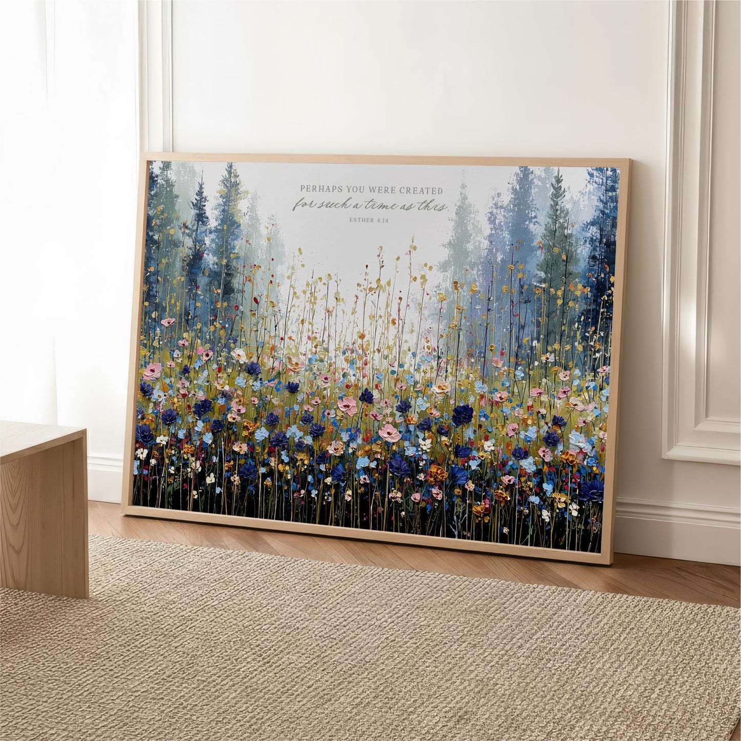 The image is a framed painting depicting a vibrant field of flowers, with a forest in the background.