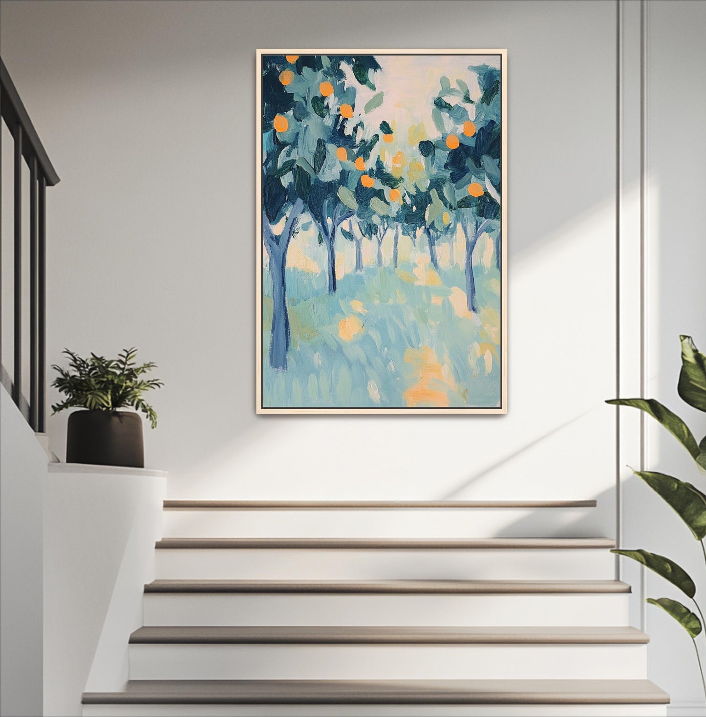 a painting of a tree-filled landscape hanging on a white wall above a set of white stairs.