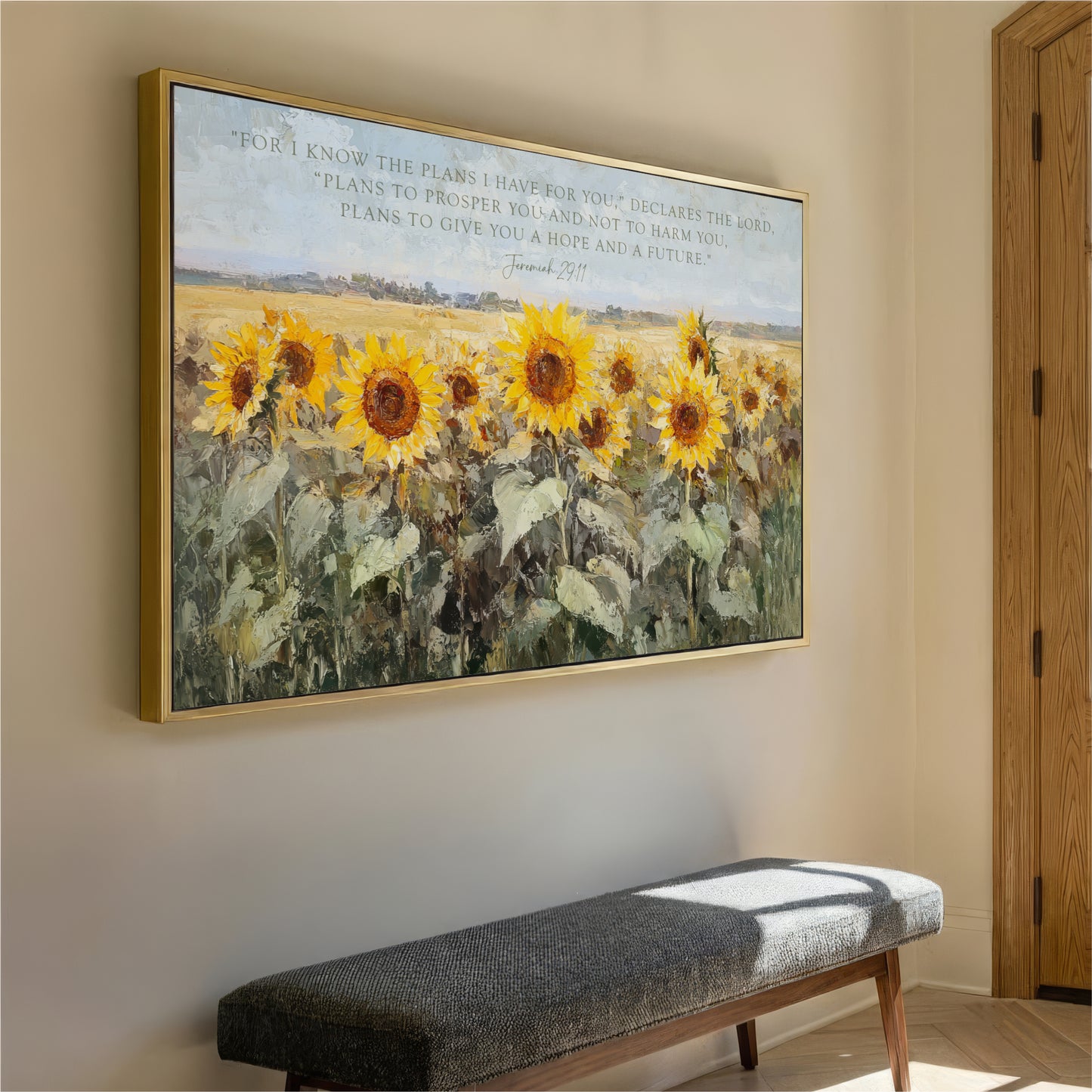 a large painting of a field of sunflowers hanging on a wall, with a bench in front of it.