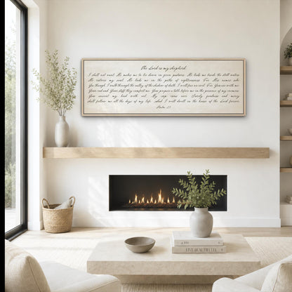 a cozy living room with a fireplace, a wooden shelf, and a framed quote on the wall. The room has a warm and inviting atmosphere, with a comfortable sofa and a coffee table in the center.