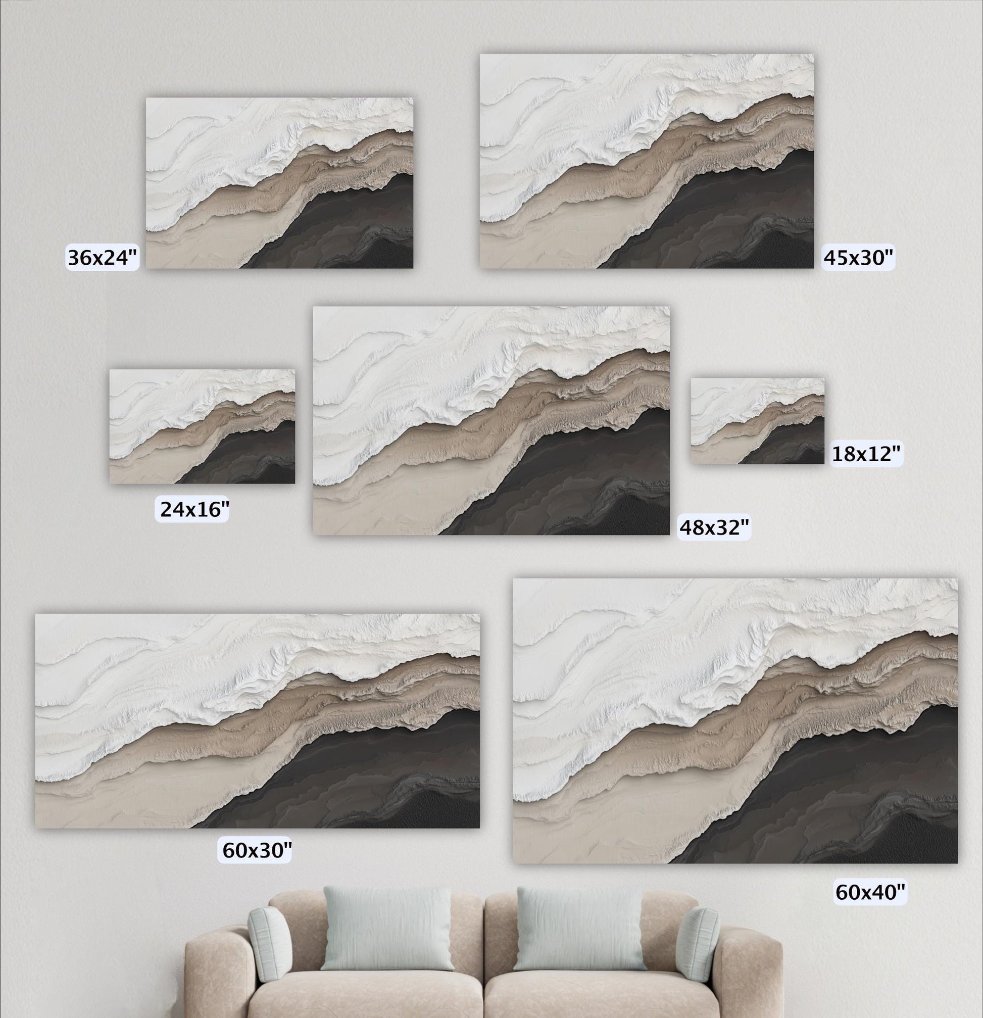 a collection of six landscape paintings, each with a different size ranging from 36x24 to 48x32. The paintings feature a mountain landscape with varying shades of brown and gray, creating a sense of depth and texture. In the background, there is a beige couch, suggesting a cozy and comfortable setting.