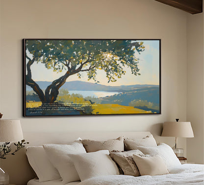 a large painting of a tree with a blue sky and mountains in the background, hanging on a wall above a bed with white pillows and a beige headboard.