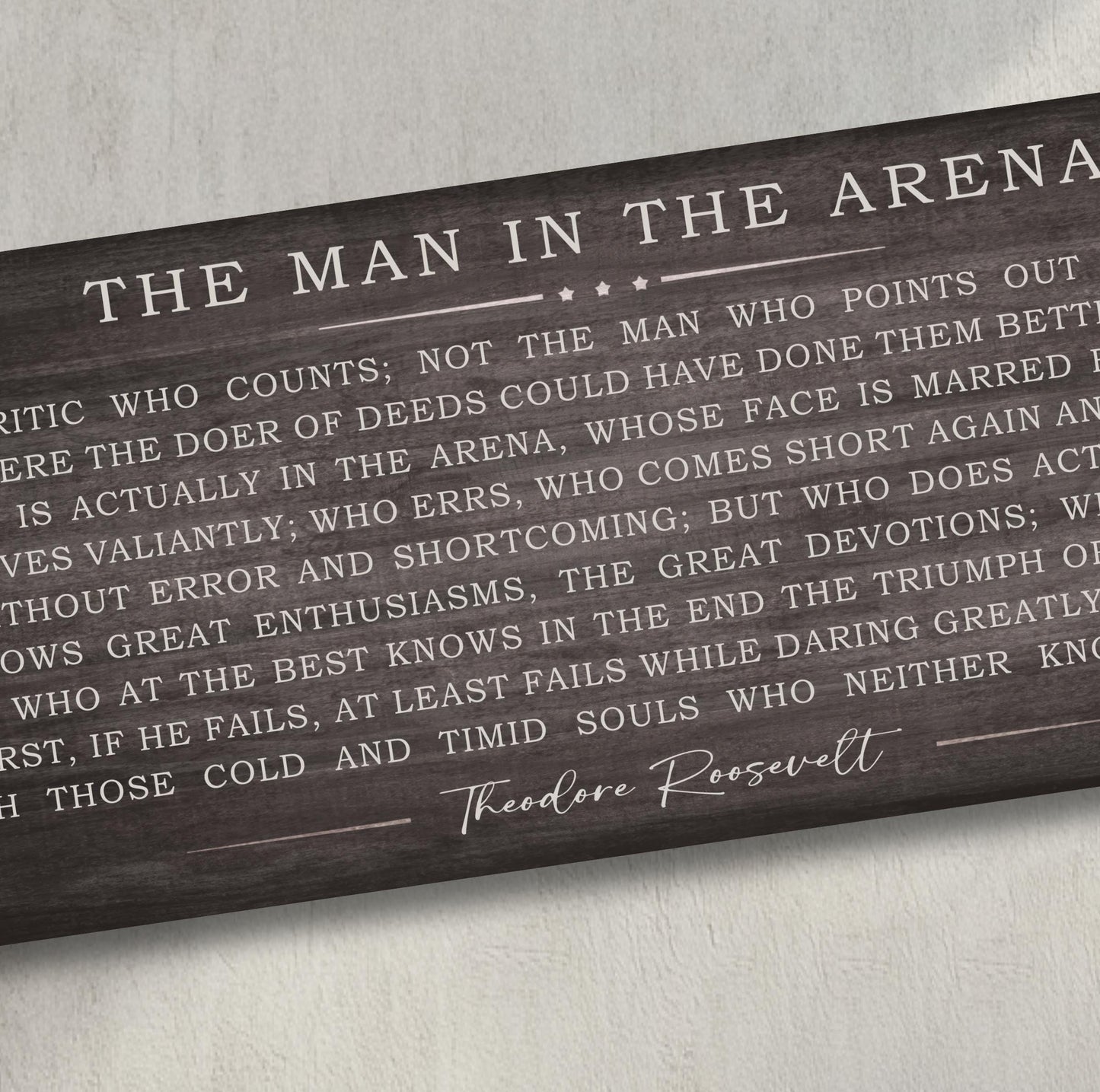 a plaque on a wall that says the main the arena