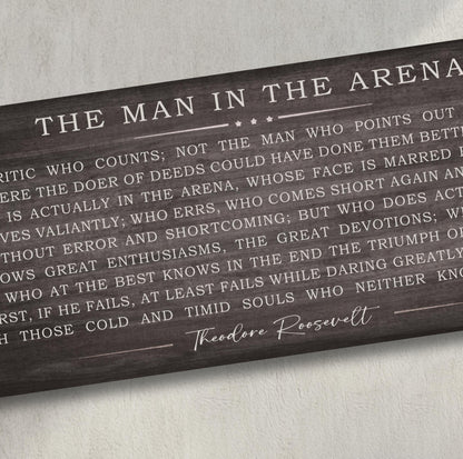 a plaque on a wall that says the main the arena