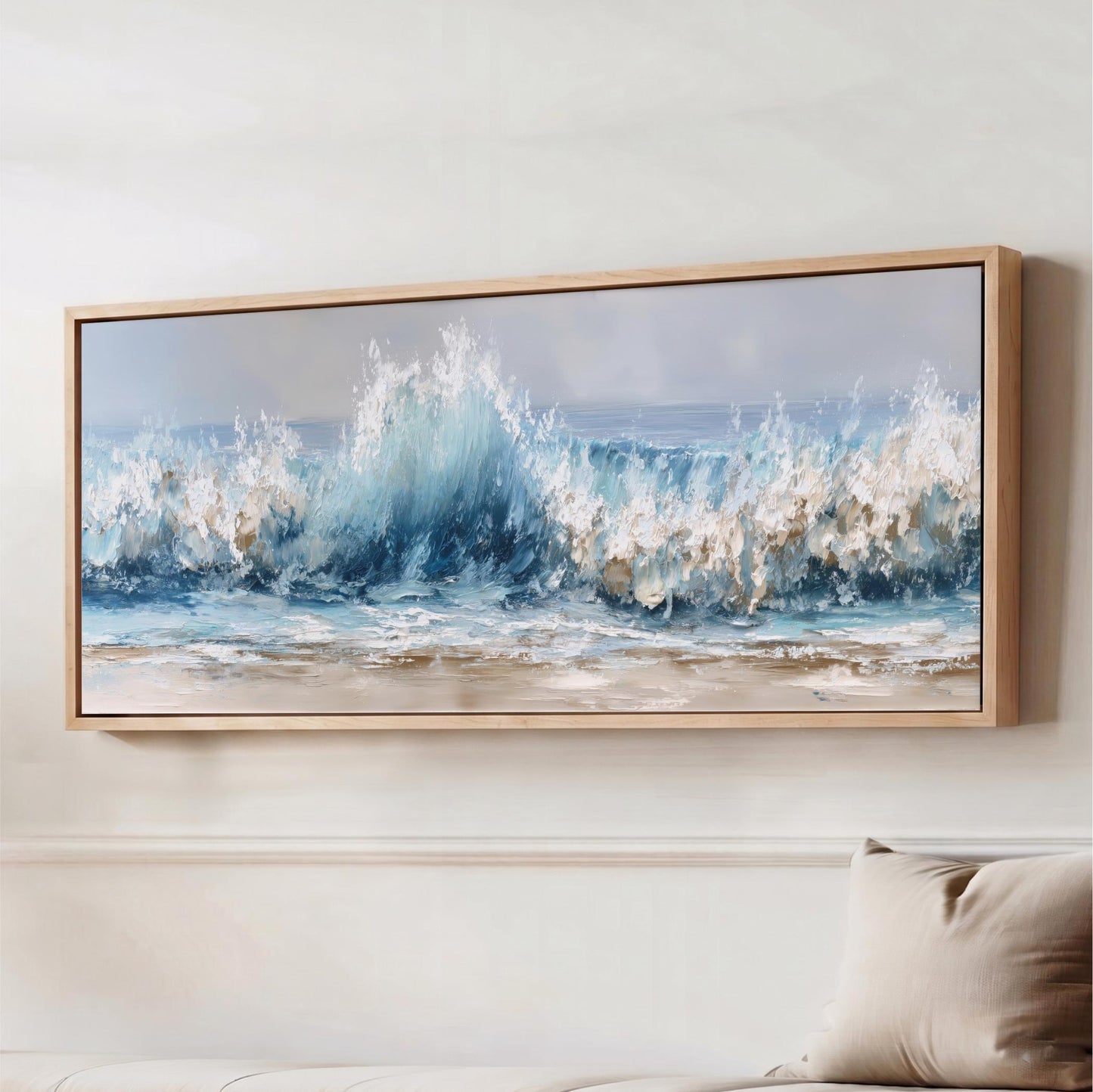 a large, framed painting of a crashing wave against a light blue sky.