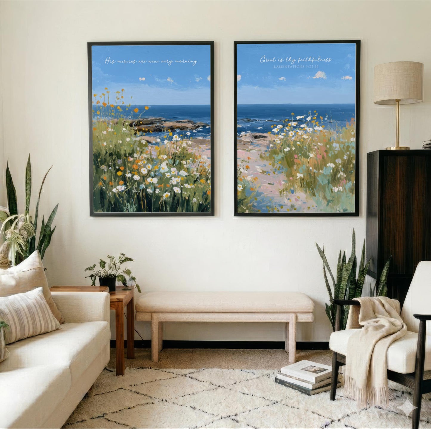 a living room with two framed paintings of a beach scene hanging on the wall. The paintings depict a serene landscape with a blue sky, ocean, and grassy area. The room is decorated with a white couch, a wooden side table, and a beige armchair. There are also several potted plants and books in the room, adding to the cozy and inviting atmosphere.