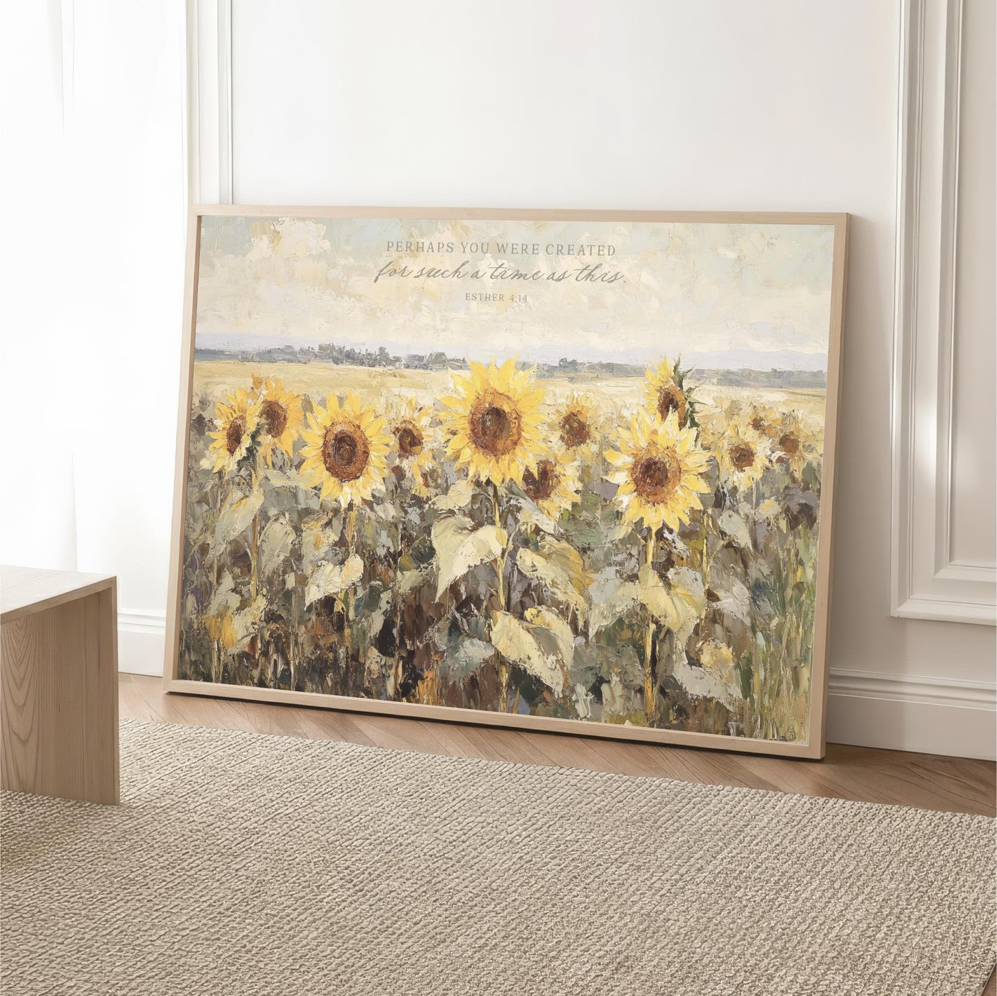 A large framed painting depicting a field of vibrant yellow sunflowers against a serene landscape.