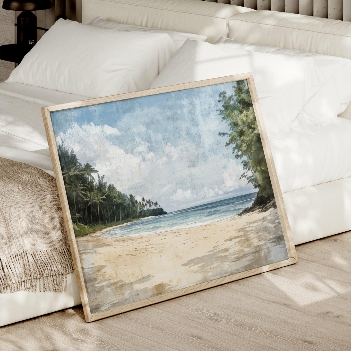 a picture frame sitting on the floor next to a bed