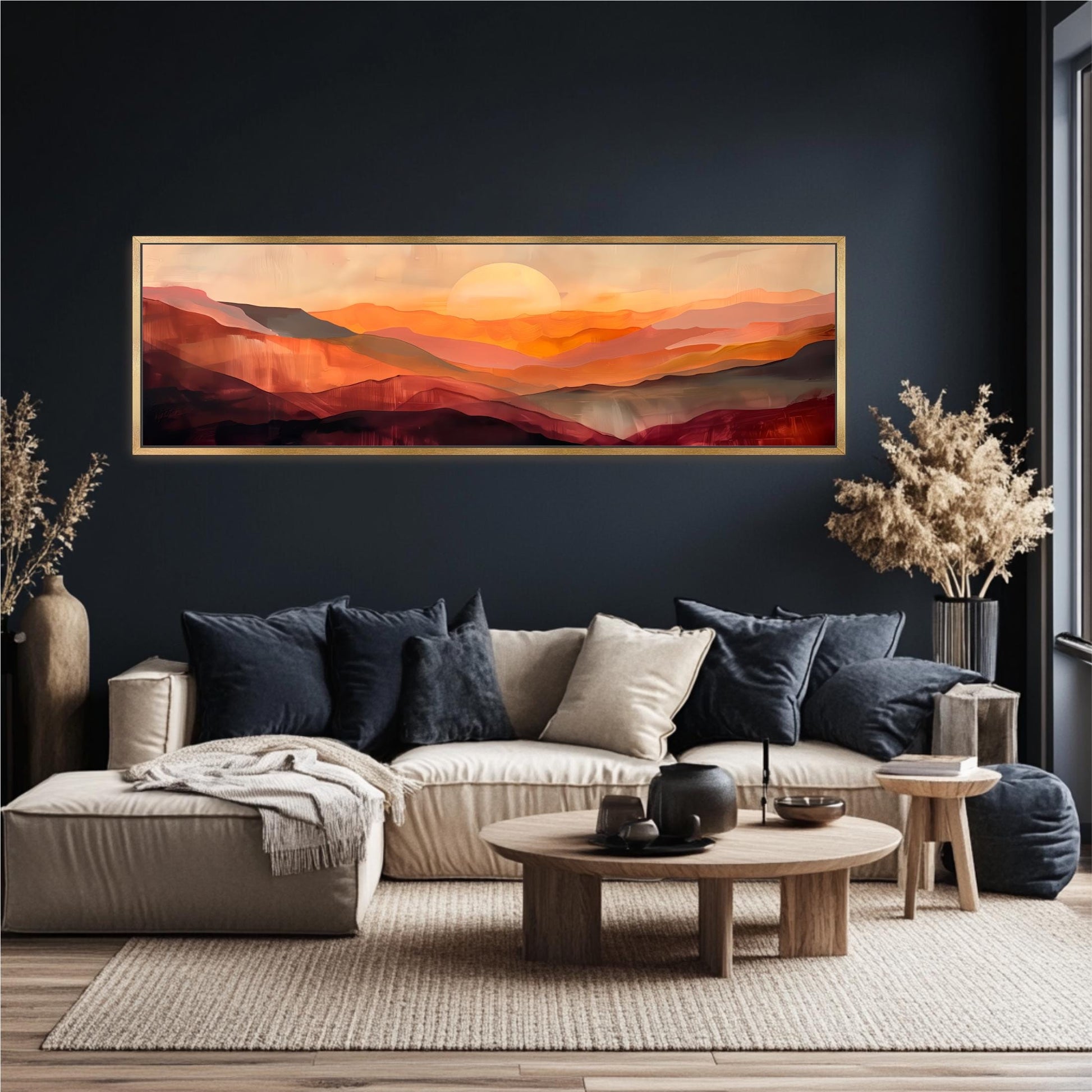 a living room with a large, rectangular painting of a sunset landscape hanging on the wall above a beige sofa with blue throw pillows. The room has a dark color scheme, with a wooden coffee table in the center and a potted plant on the right side.