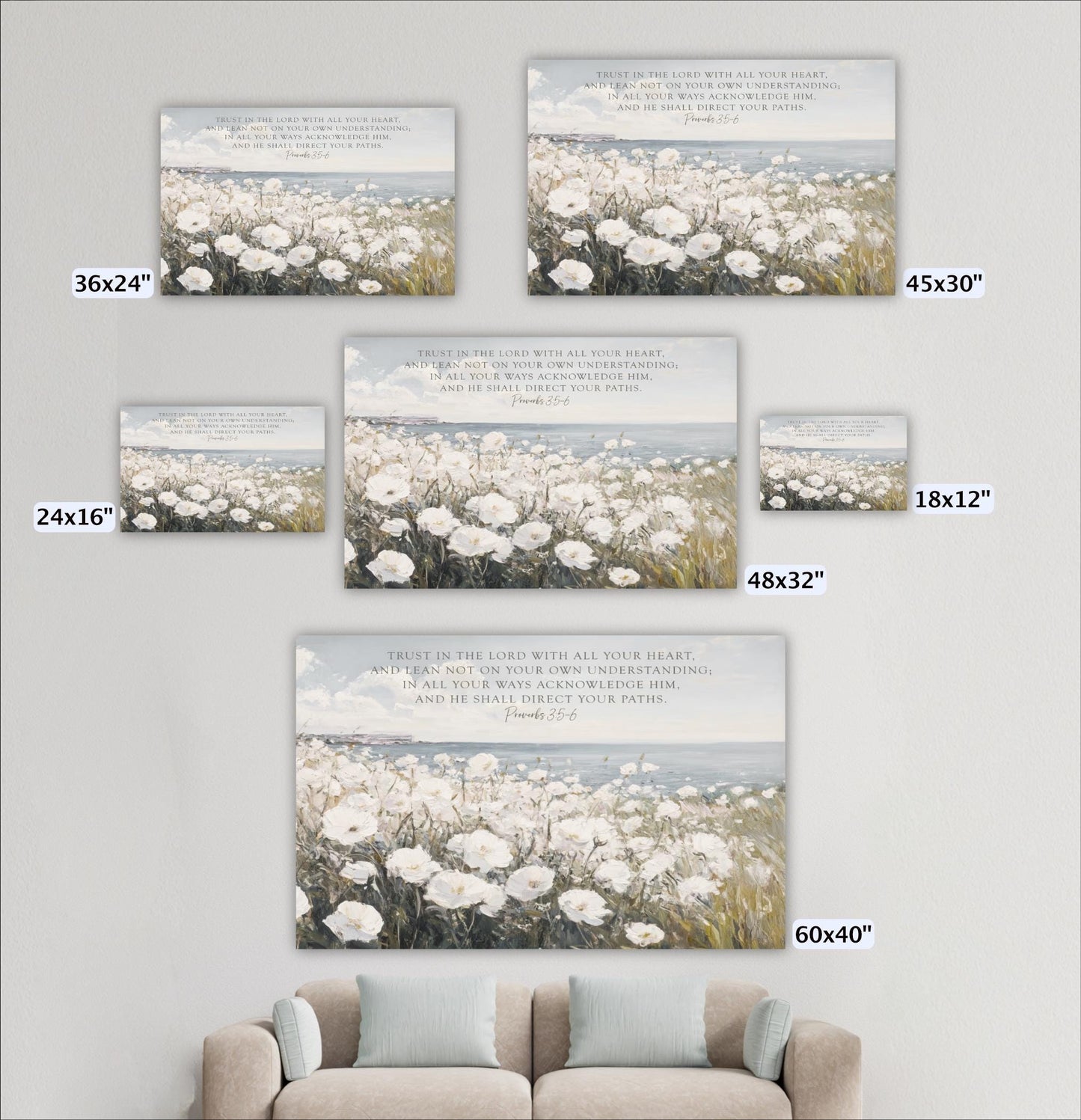 a living room with a couch and pictures on the wall