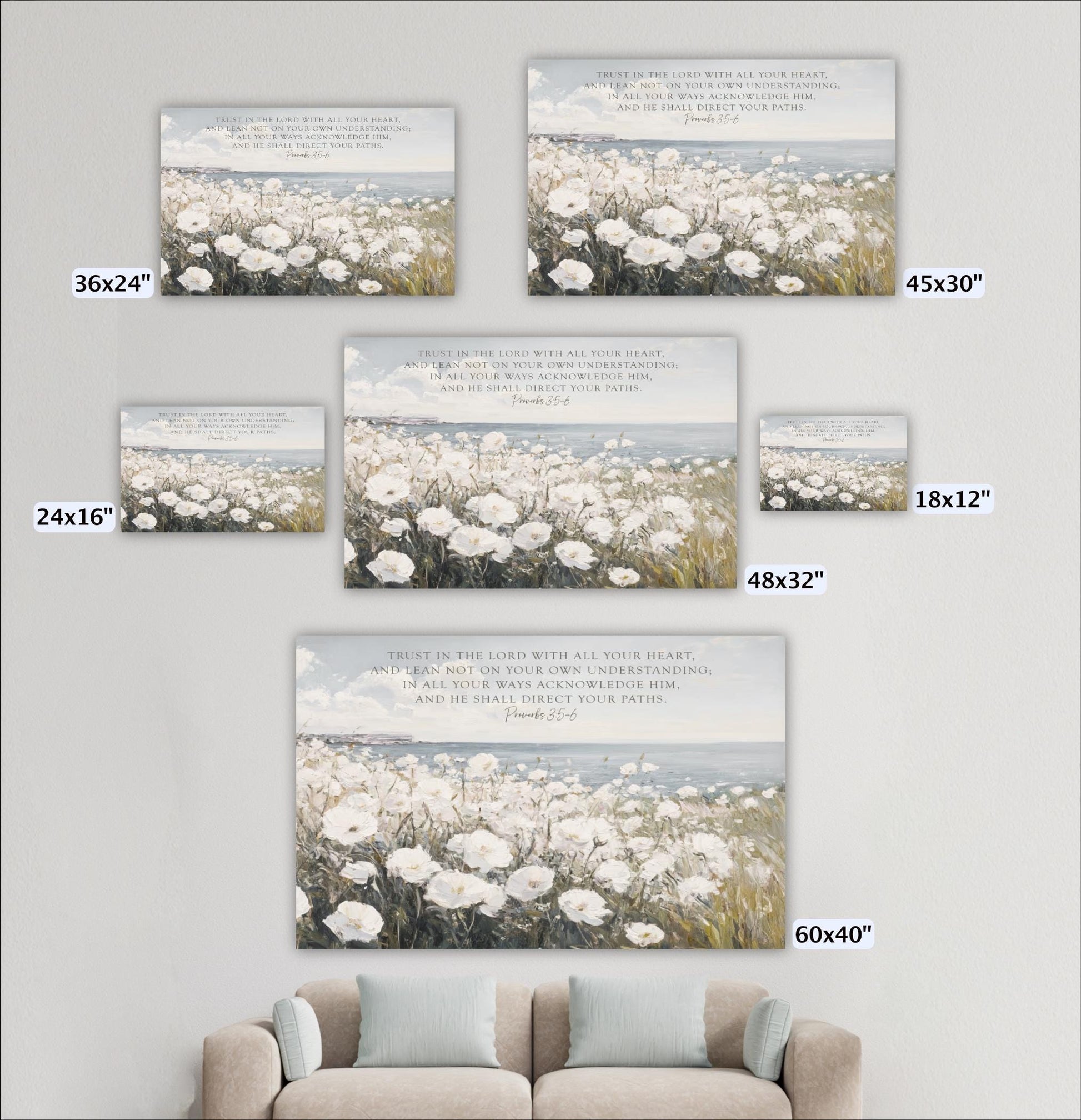 a living room with a couch and pictures on the wall