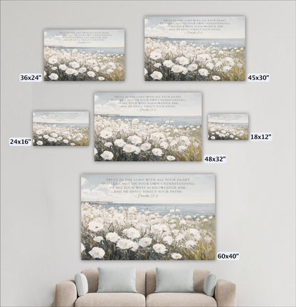 a living room with a couch and pictures on the wall