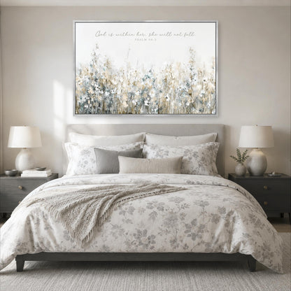 a serene bedroom scene with a large floral-patterned bed, a nightstand on each side, and a framed Bible verse on the wall above the bed.
