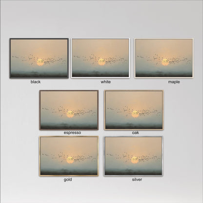 six different framed pictures of a sunrise or sunset, each with a flock of birds flying in the sky. The pictures are arranged in a grid format, with each row representing a different color or style of frame. The colors include black, white, maple, espresso, oak, and gold.