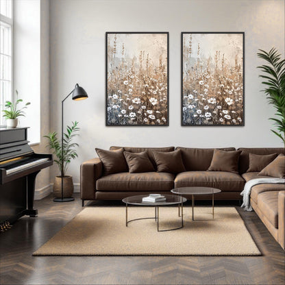 a modern living room with a brown leather sofa, a glass coffee table, and two framed paintings of flowers on the wall.