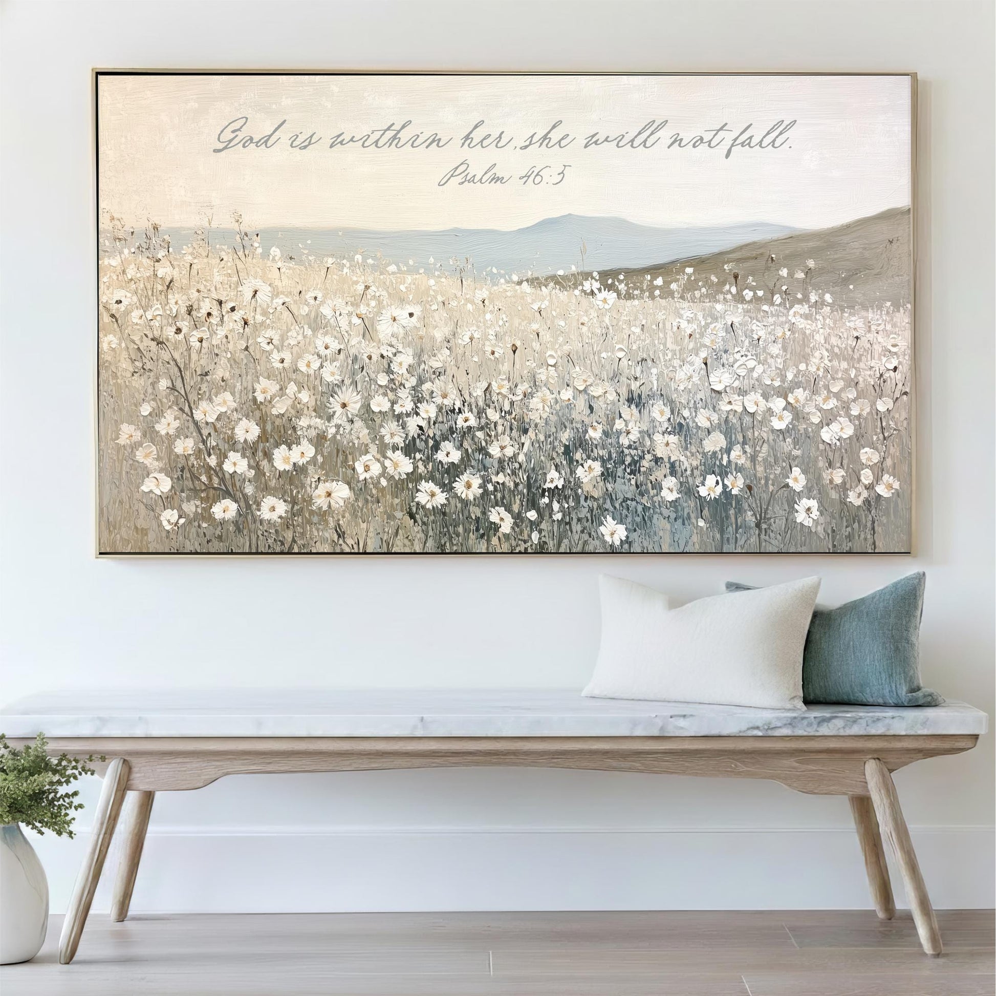 a large painting of a field of flowers hanging on a wall above a wooden bench.