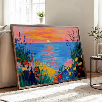 A large, vibrant painting depicting a colorful sunset over a body of water, with a lush, flower-filled foreground.