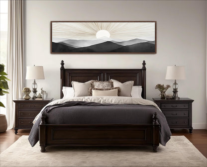 a serene bedroom scene with a large bed, dark wood furniture, and a framed landscape painting on the wall.