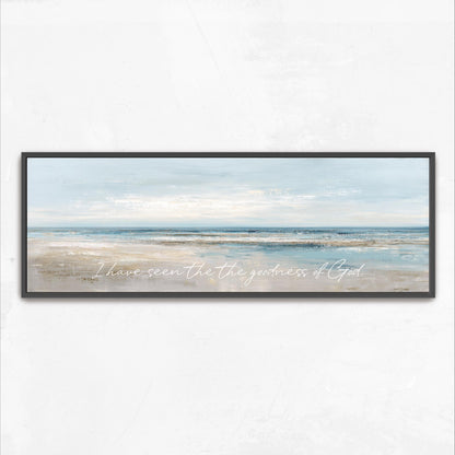 The image is a framed painting depicting a serene beach scene with a vast ocean and a cloudy sky.