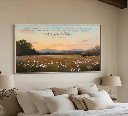 a serene landscape with a field of flowers and mountains in the background, framed by a quote from the Bible.
