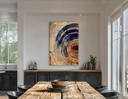 a modern dining room with a large abstract painting hanging on the wall above a wooden dining table. The table is set with plates and bowls, and there are several potted plants and vases placed around the room.