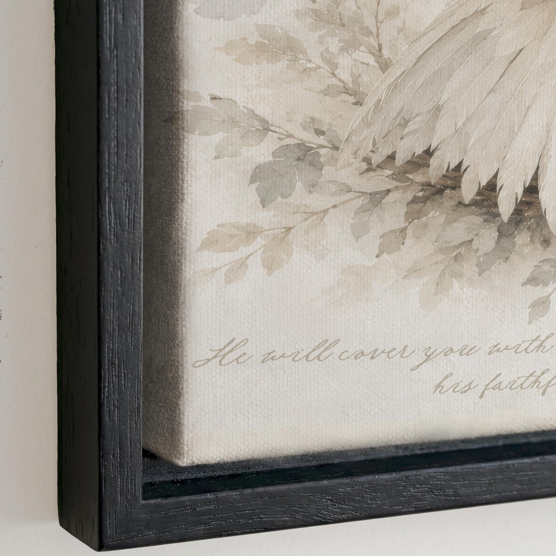 The image is a framed artwork featuring a close-up of a leafy branch with a bird perched on it. The text "He will cover you with his faith" is visible, likely providing a biblical or spiritual message.
