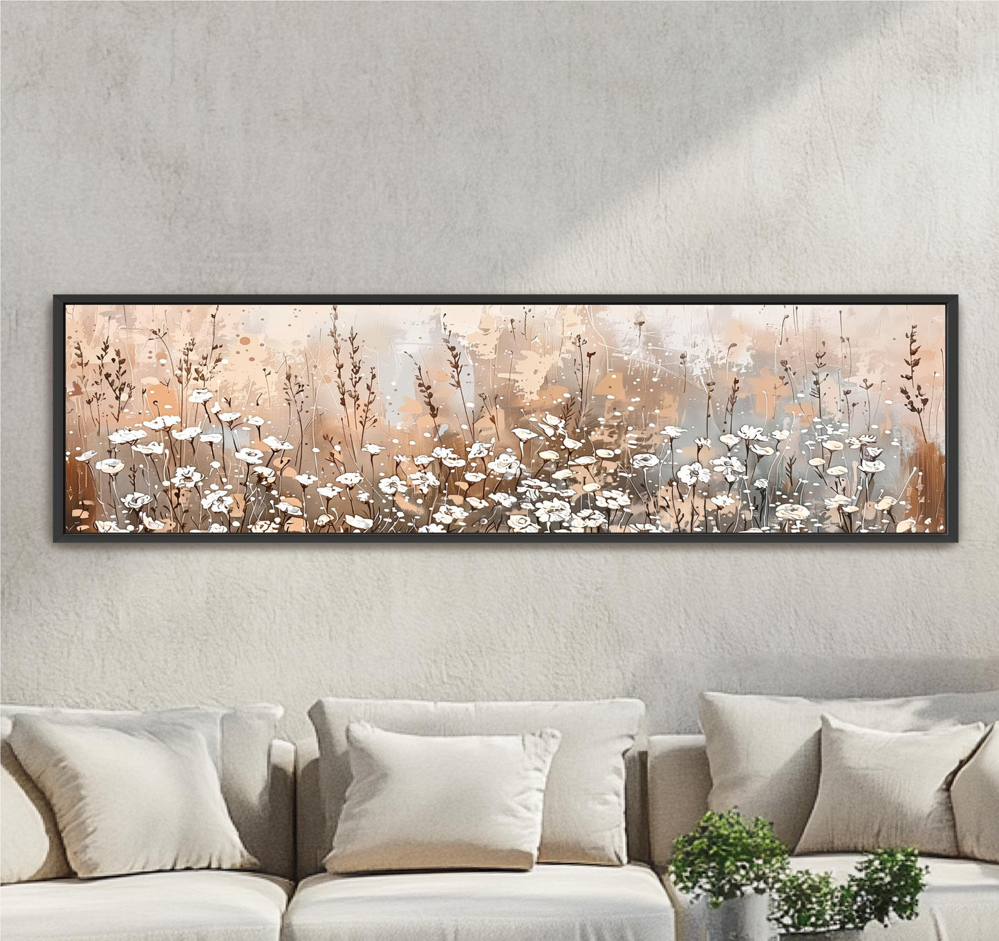 a large, rectangular painting of a field of flowers hanging on a wall above a couch.