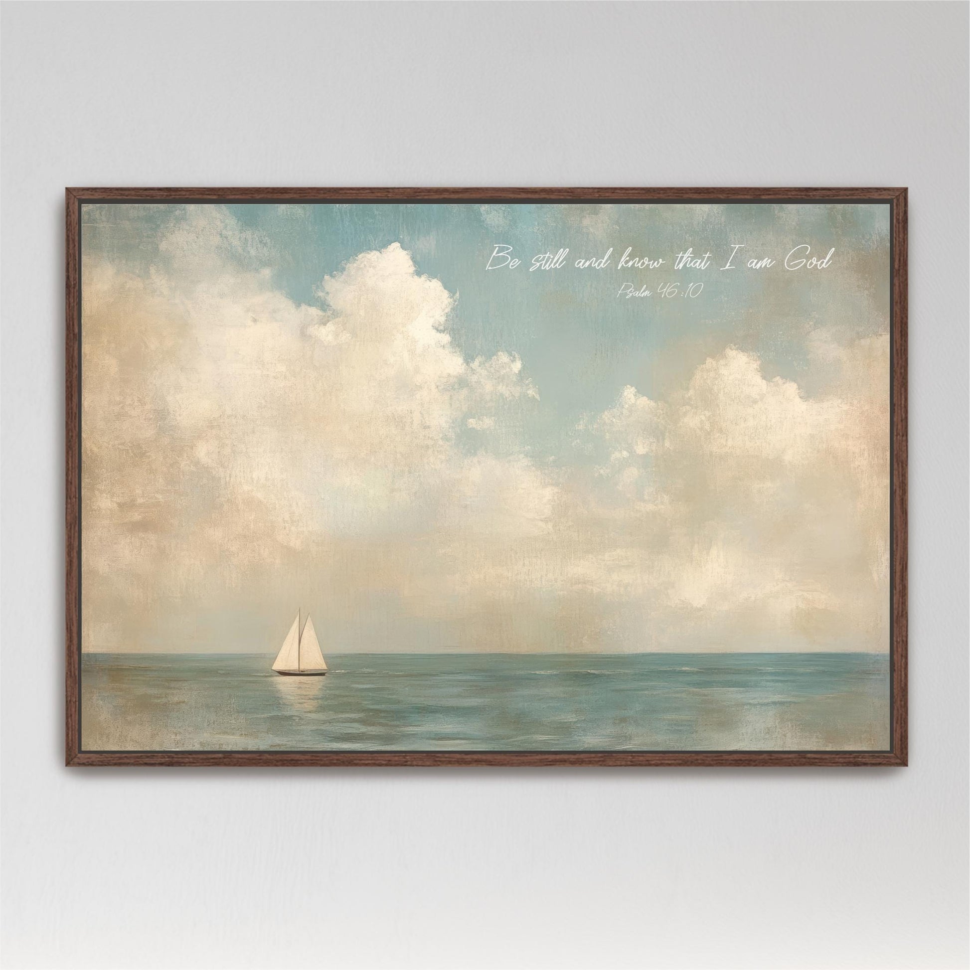 A framed painting depicting a sailboat on the ocean with a cloudy sky in the background.