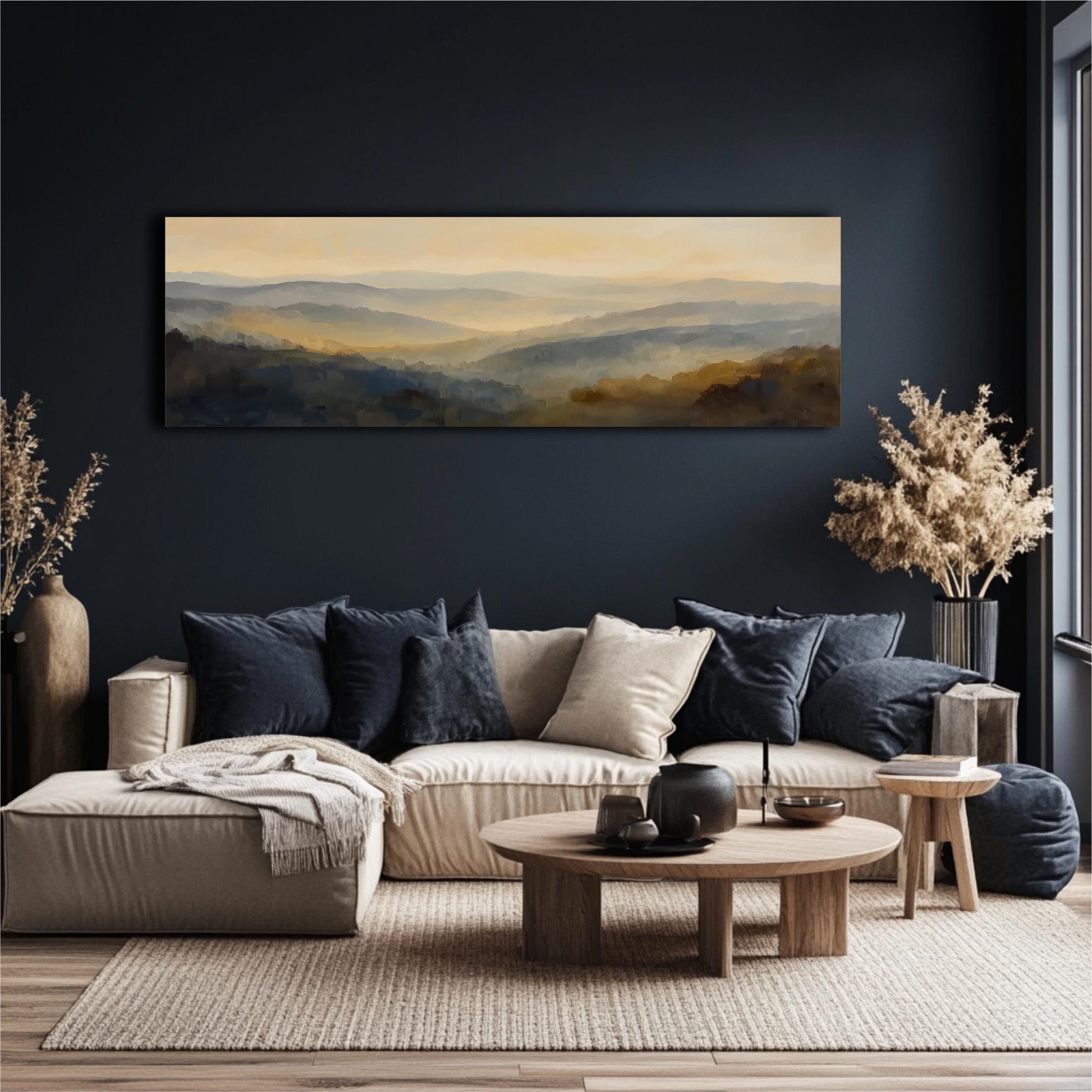 a modern living room with a large painting of a landscape hanging on the wall above a beige sofa with blue throw pillows. The room has a dark blue wall, a wooden coffee table, and a large window with white curtains. There are also two potted plants and decorative vases in the room, adding to the overall aesthetic.